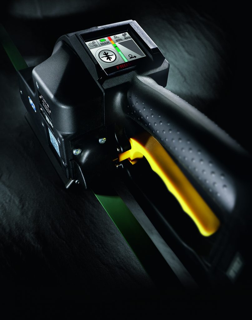 Battery powered tools for plastic strapping